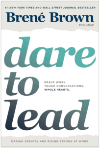Book cover of Dare to Lead by Brené Brown, featuring bold teal and navy gradient typography with the subtitle: “Brave Work. Tough Conversations. Whole Hearts.”