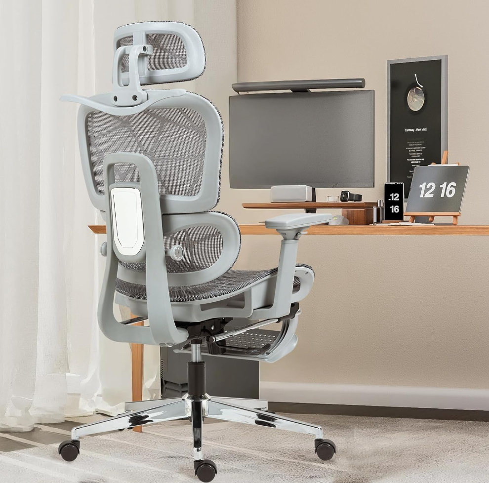 Ergonomic office chair with mesh backrest and adjustable headrest in a minimalist workspace setup.
