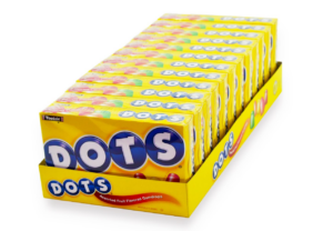 Display box of Dots assorted fruit flavored gumdrops candy packs in yellow packaging.