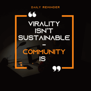 Motivational quote graphic with the text: “Virality isn’t sustainable – Community is,” over a dark workspace background with the ChannlerG logo.