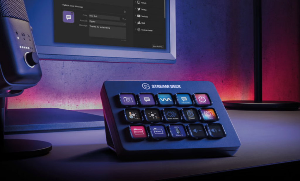 Elgato Stream Deck on a desk with customizable LCD keys and monitor in the background.