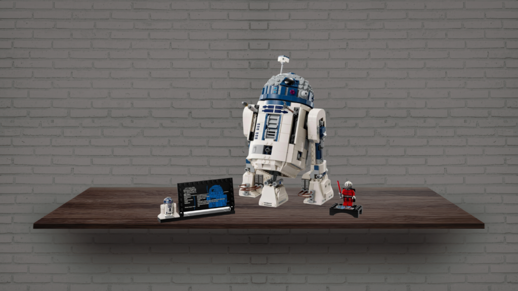 LEGO R2-D2 display model on a wooden shelf with included minifigure, information plaque, and Darth Malak collectible figure.