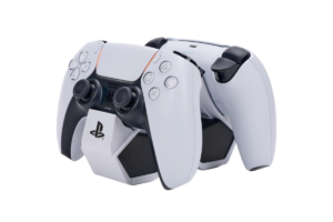 White PlayStation 5 DualSense controller resting on a matching charging dock, designed for wireless gaming and convenient controller charging.