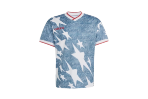 Vintage-inspired USA soccer jersey with a blue star pattern, white accents, and red trim on a transparent background.
