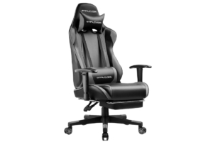 Black GTPLAYER gaming chair with ergonomic racing-style design, adjustable armrests, lumbar support cushion, headrest pillow, and high-back seating for gaming and office use.