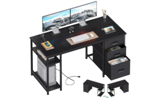 AODK computer desk with drawers featuring a spacious black desktop, multiple storage drawers, dual-monitor setup, headphone hook, and modern workspace organization.