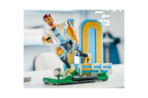 LEGO Lionel Messi Soccer Legend display model in a dynamic dribbling pose with a soccer ball, number 10 backdrop, and printed name plaque.