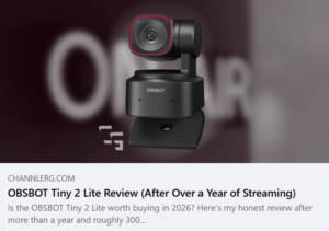 Featured image for an OBSBOT Tiny 2 Lite review showing the AI-powered 4K webcam against a blurred background, highlighting its compact design and PTZ auto-tracking capabilities.
