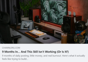Minimal creator desk setup with a monitor, tablet, mechanical keyboard, speakers, and camera equipment, representing the challenges of building a content creation brand over nine months.