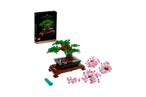 LEGO Icons Bonsai Tree set featuring interchangeable green leaves and pink cherry blossom foliage in a decorative display pot.