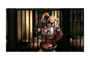 Harley Quinn posing in front of prison cells in Batman: Arkham Asylum, wearing her red and purple outfit, black eye mask, and blonde pigtails.