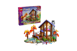 LEGO Friends Cozy Fall Forest Cabin set with autumn trees, stream, bicycle, and Friends characters