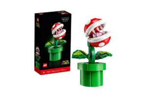 LEGO Super Mario Piranha Plant set 71426 featuring a red and white Piranha Plant with sharp teeth, green leaves, and a brick-built green pipe alongside its LEGO packaging.