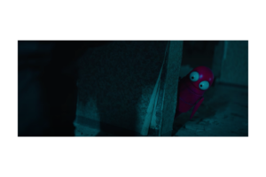 Pink robot character peeking around a wall in a dark scene from R.E.P.O.